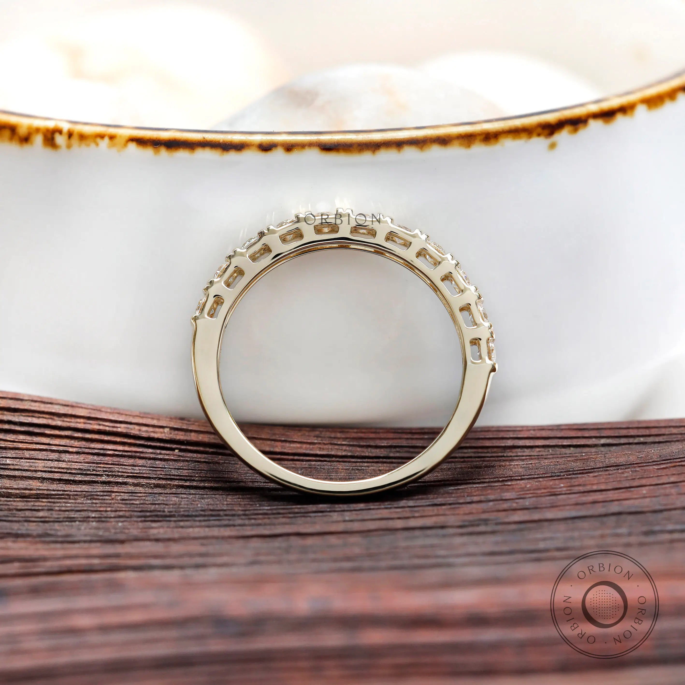 Interior gallery view yellow gold round diamond half eternity band