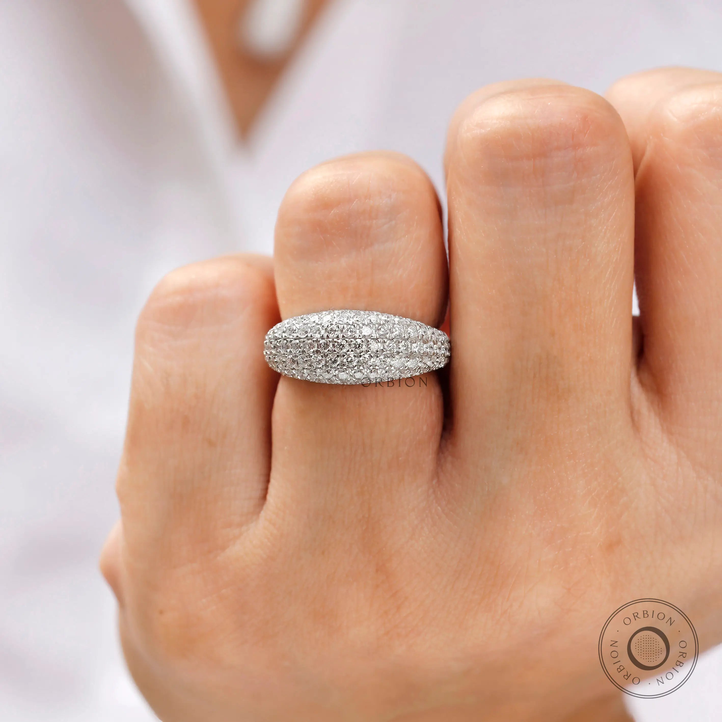 Pave set iced out lab grown diamond dome ring in 14k white gold on hand