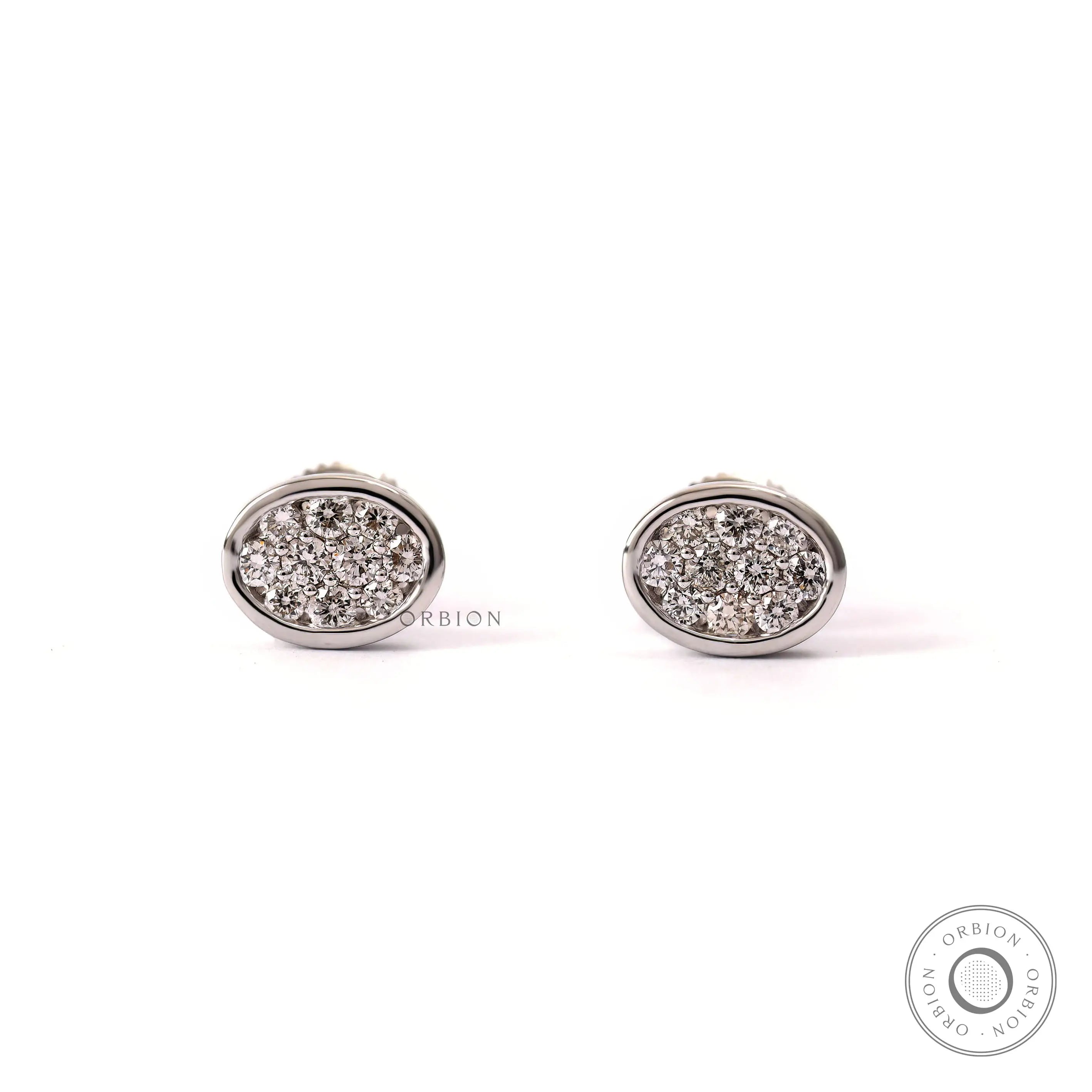 Oval shaped pave lab grown diamond cluster stud earrings in 14k white gold.