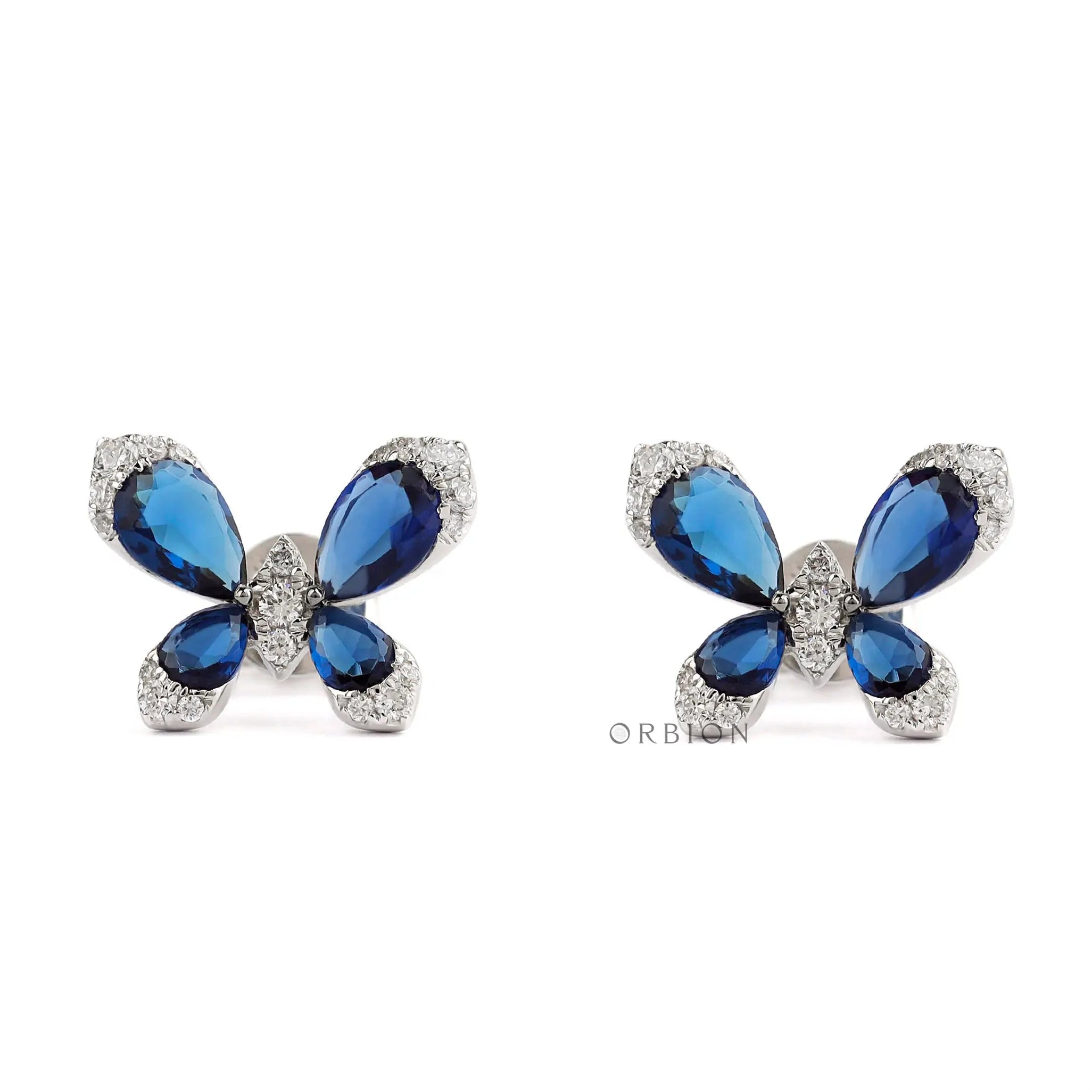 Blue sapphire butterfly stud earrings with diamond accents in white gold