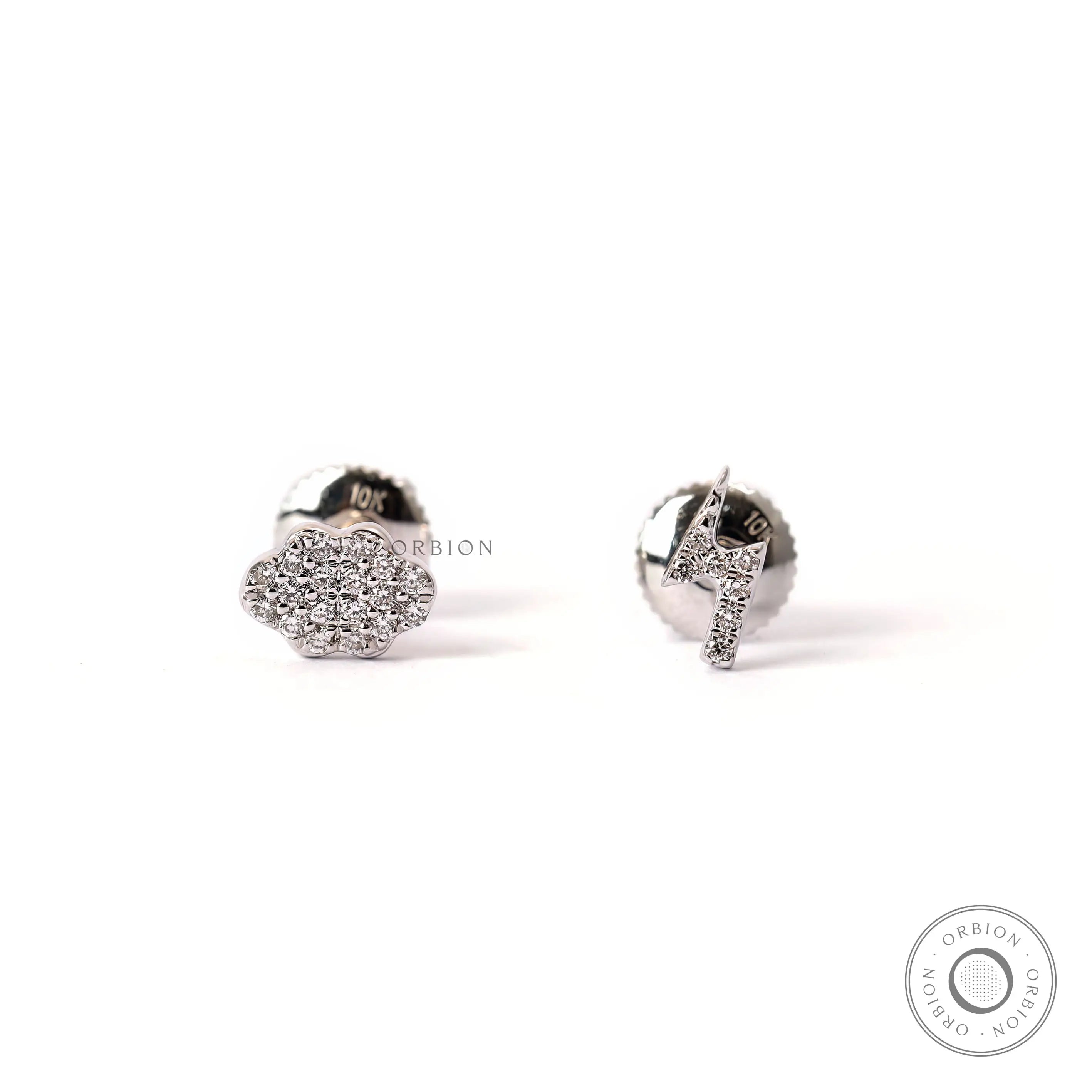 Cloud and lightning bolt mismatch stud earrings in 10K white gold