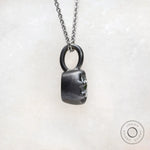 Old mine cut moissanite pendant in oxidized silver setting