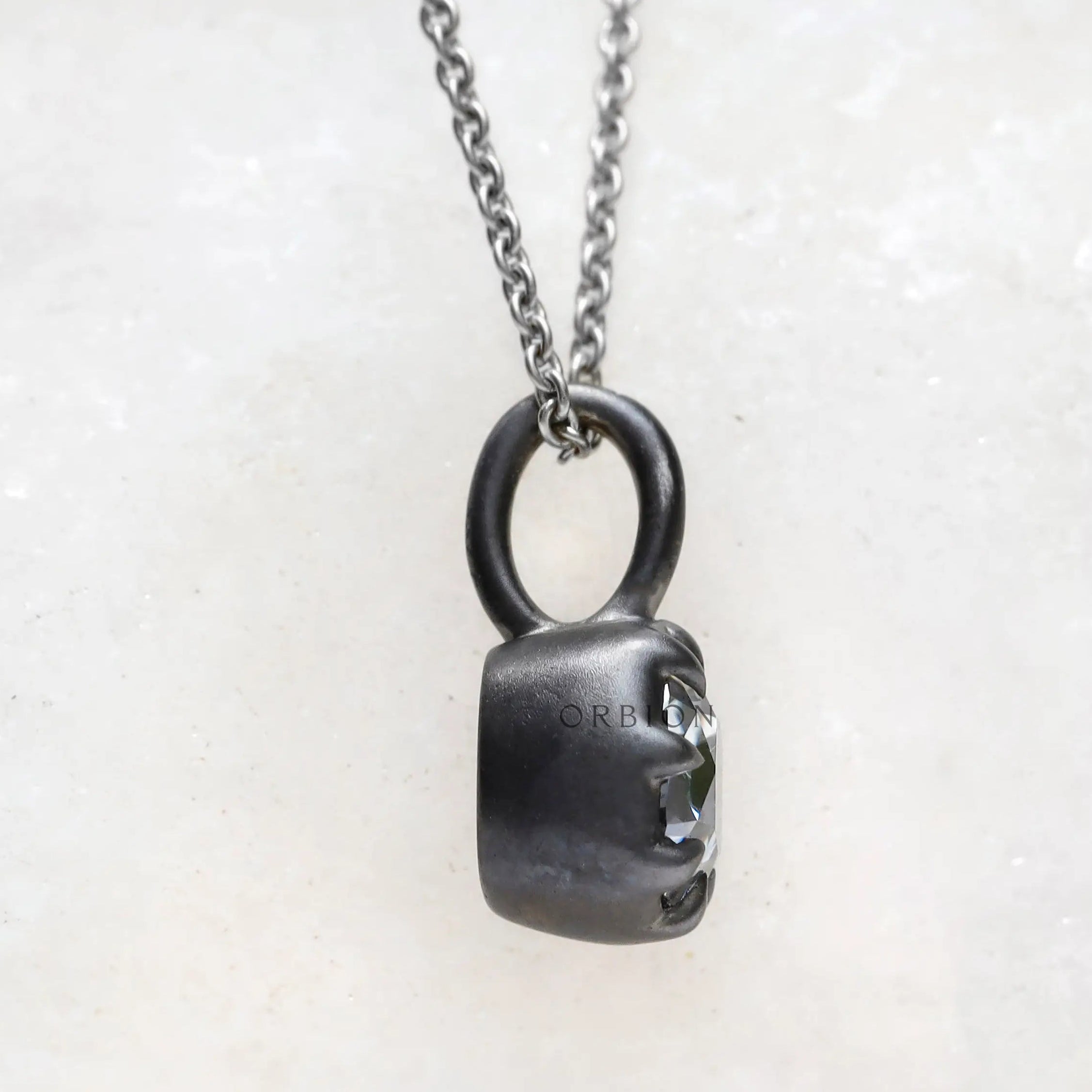 Old mine cut moissanite pendant in oxidized silver setting