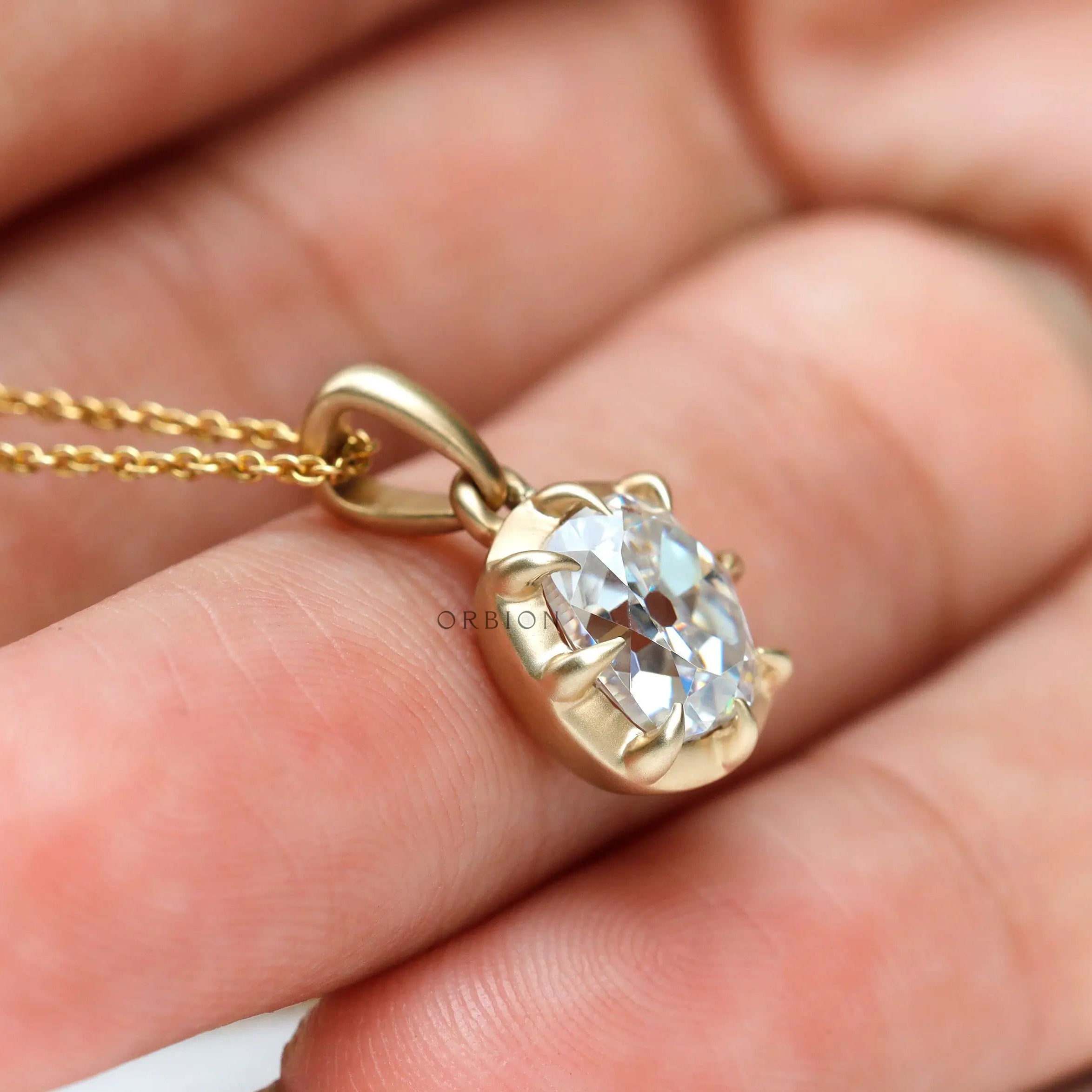 Elongated cushion lab diamond pendant on chain lifestyle image