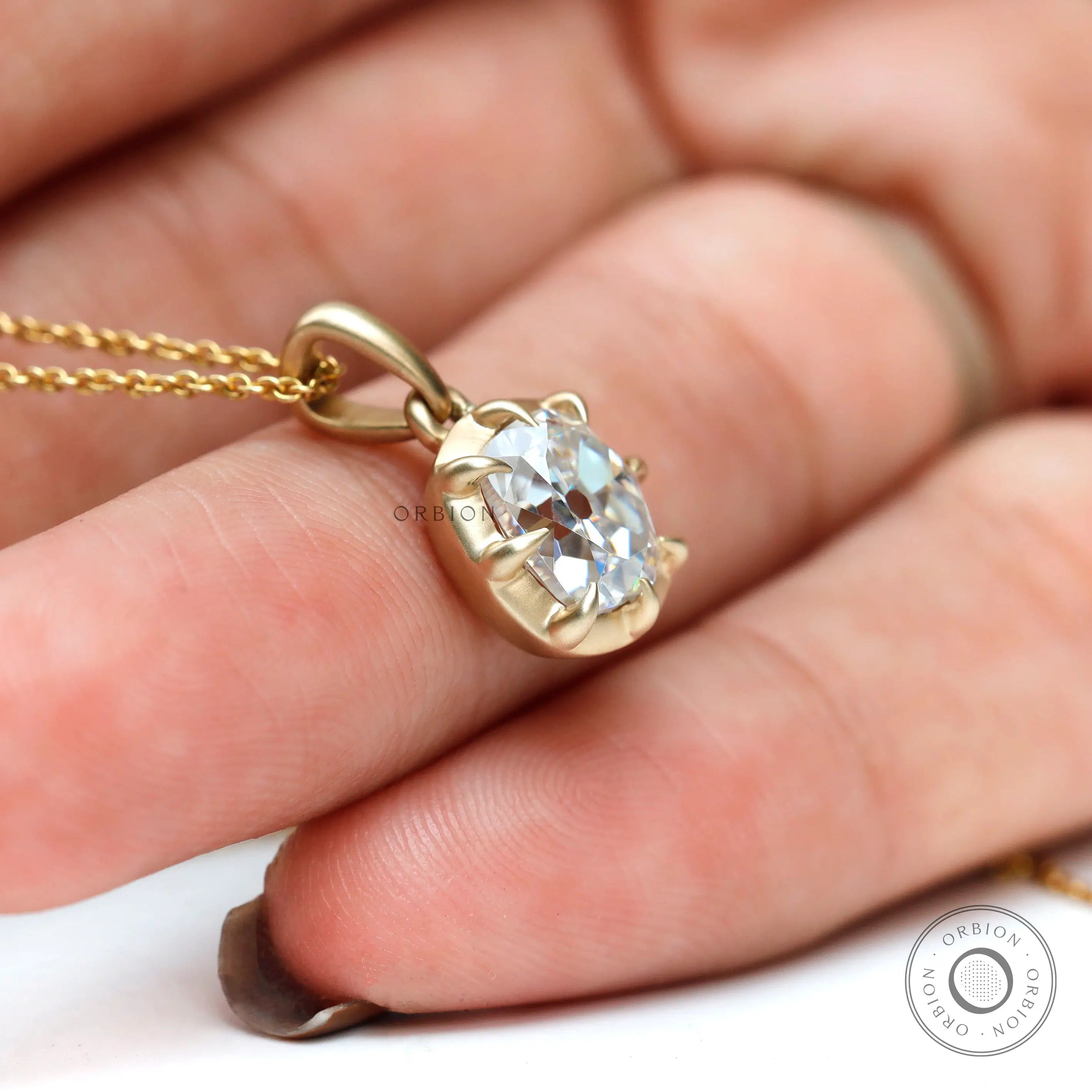 Elongated cushion lab diamond pendant on chain lifestyle image