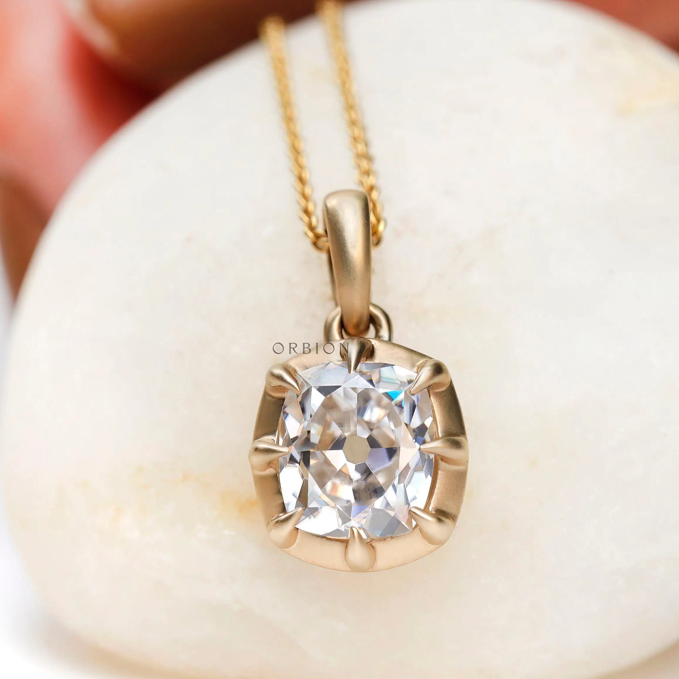 Old mine cut elongated cushion moissanite pendant in 14k yellow gold matte finish