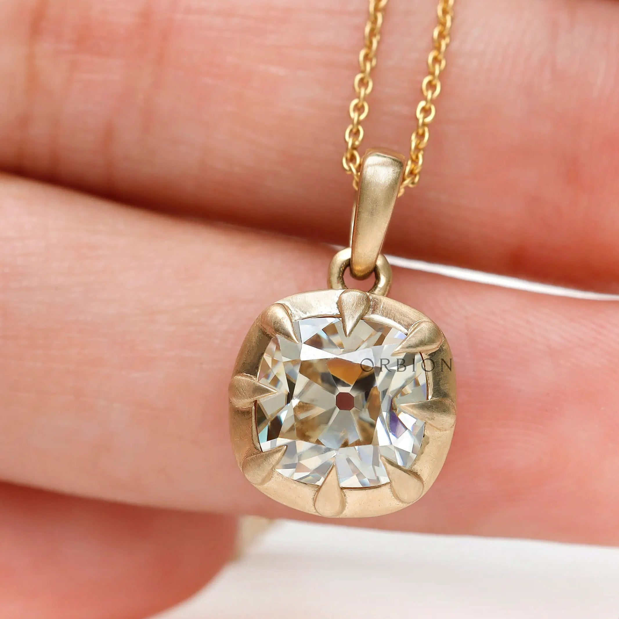 Vintage old mine cut cushion pendant in 10K yellow gold satin finish front view