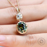 Satin matte 10K yellow gold two stone pendant close up