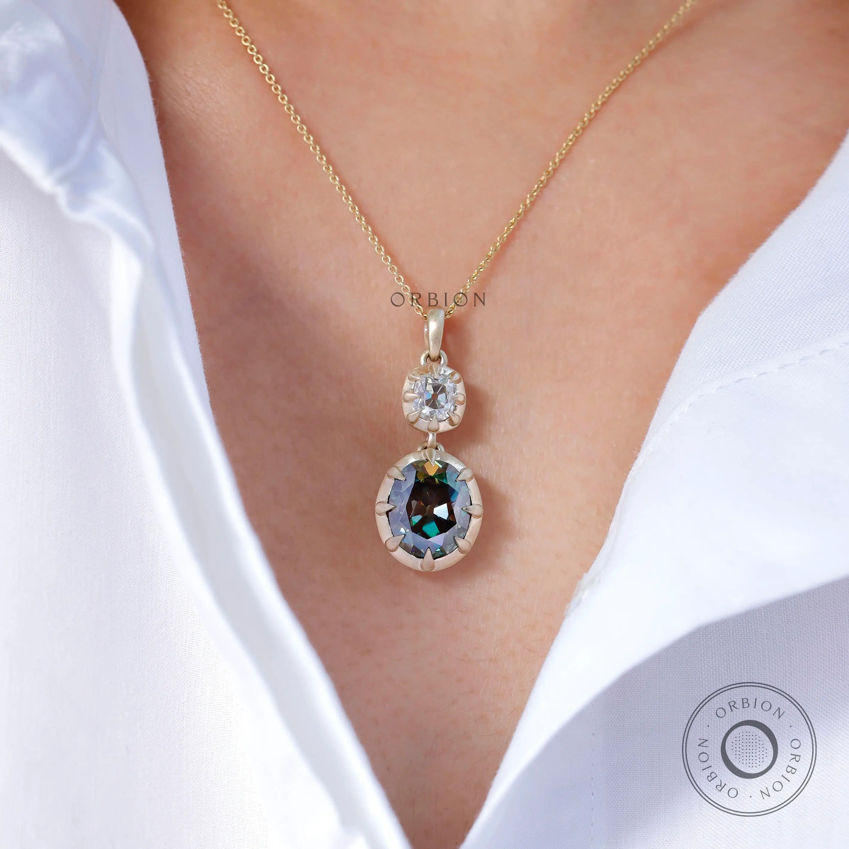 Antique style two stone vertical dangling moissanite pendant on model