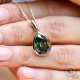 Pear old mine cut green moissanite pendant