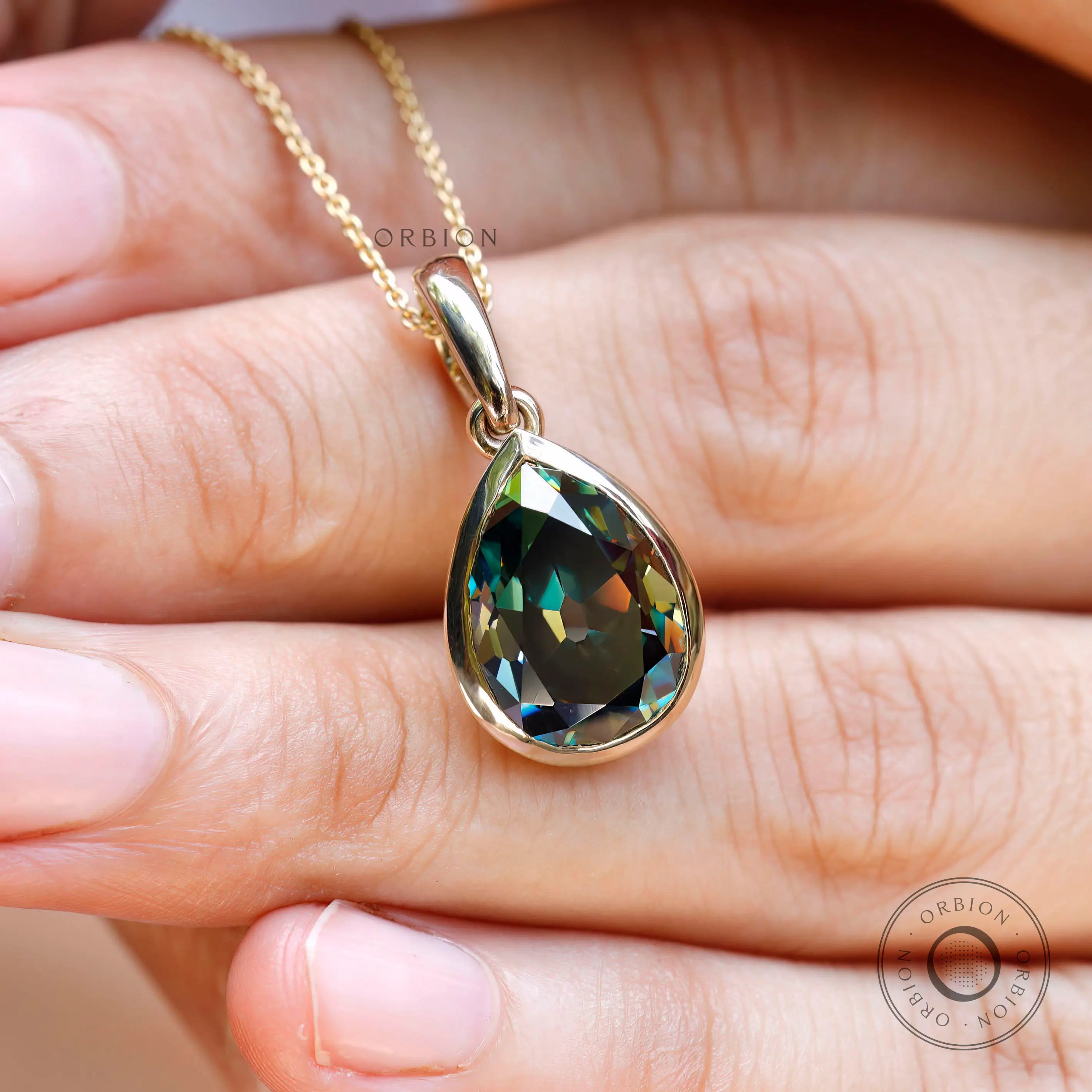Pear old mine cut green moissanite pendant