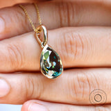 Glossy 14K yellow gold pear shaped drop pendant