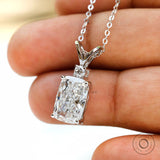 Angled close up of split V bail diamond pendant.