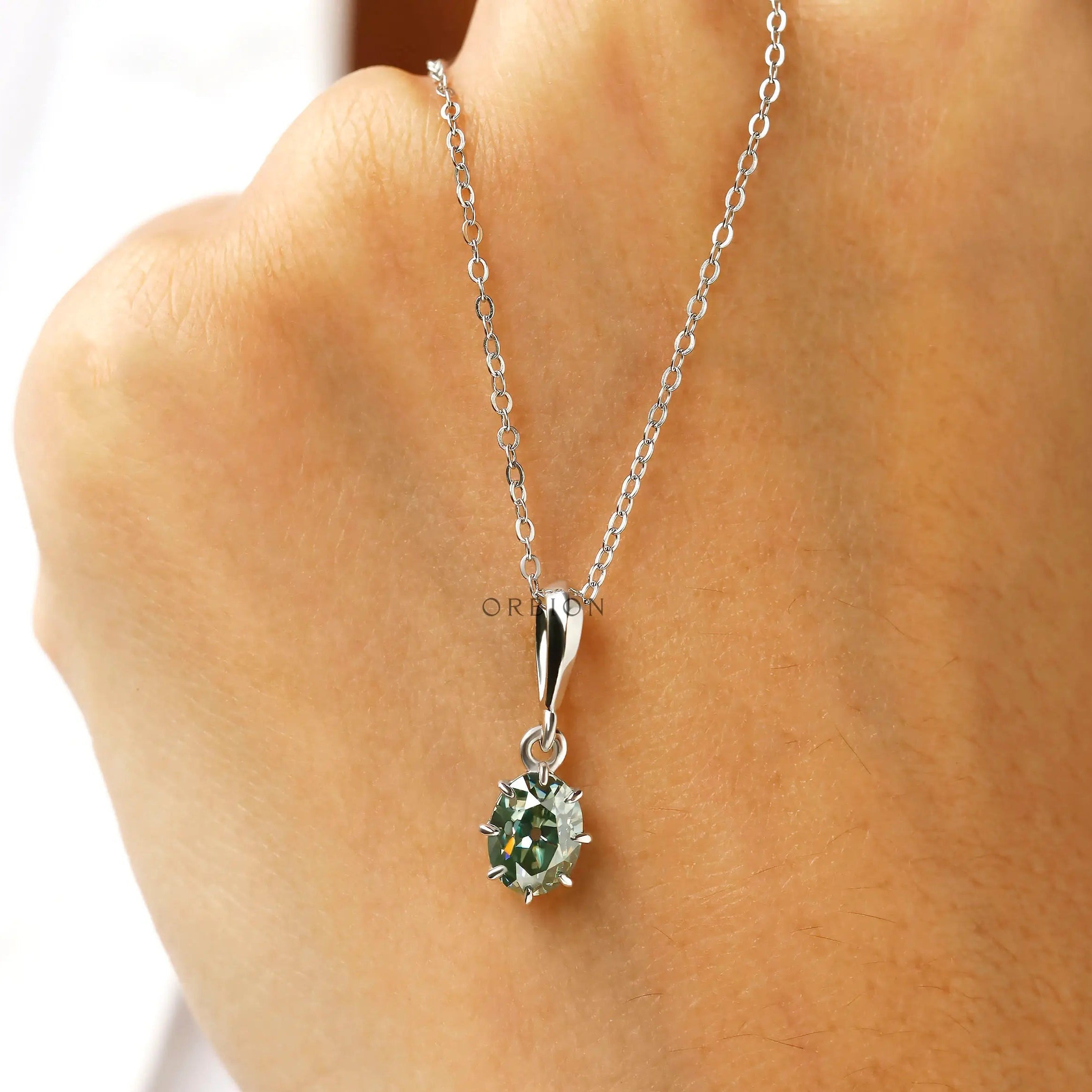 Antique style oval moissanite pendant with glossy white gold finish