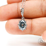 Oval old mine cut bluish grey moissanite pendant in 10k white gold