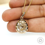 6 CT Georgian style off white pear moissanite pendant in 18K yellow gold bezel