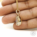Georgian style off white pear moissanite pendant, 6 CT in yellow gold bezel