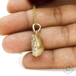 Old Mine Cut Pear Moissanite Necklace with Spray Matte Finish in 18K Gold
