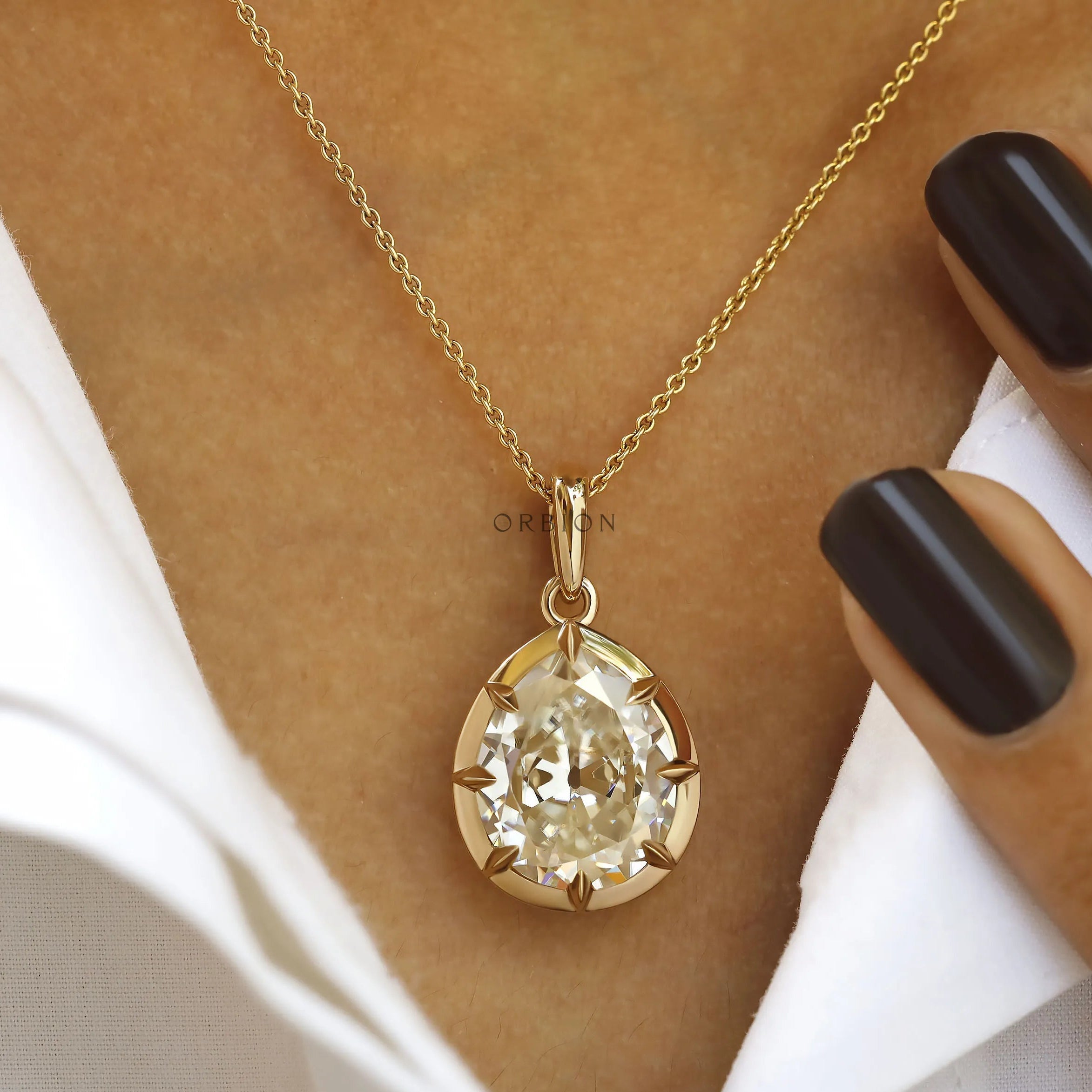 6 CT pear moissanite pendant, off white, georgian style with 18K yellow gold bezel