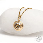 10k yellow gold bezel pendant featuring Old European cut champagne moissanite, 1.50 Ct