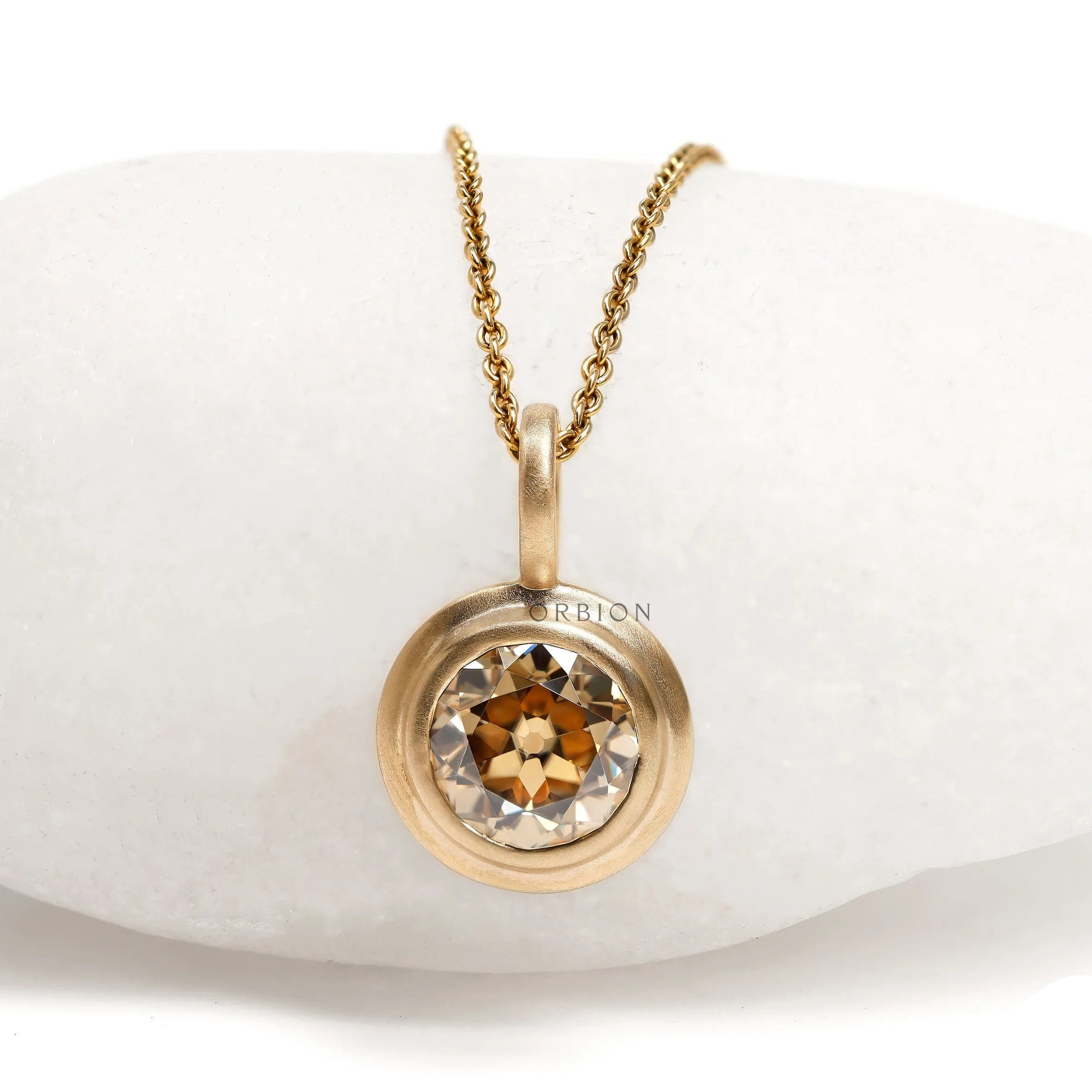 Elegant 1.50 Ct champagne moissanite pendant in bezel setting, 10k yellow gold with matte finish