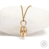 Champagne moissanite pendant with bezel setting in 10k yellow gold, brushed matte finish