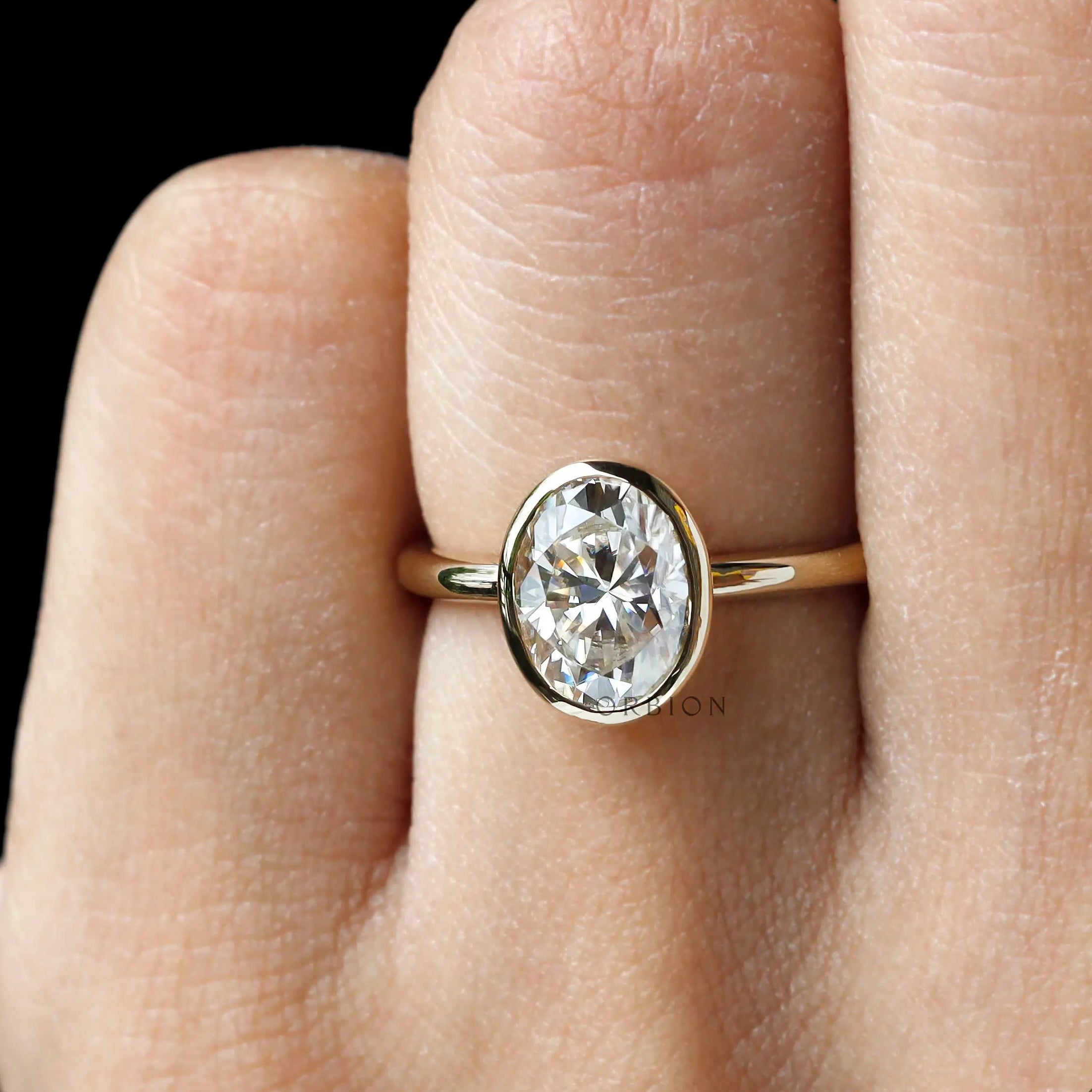 oval bezel lab diamond solitaire wedding ring