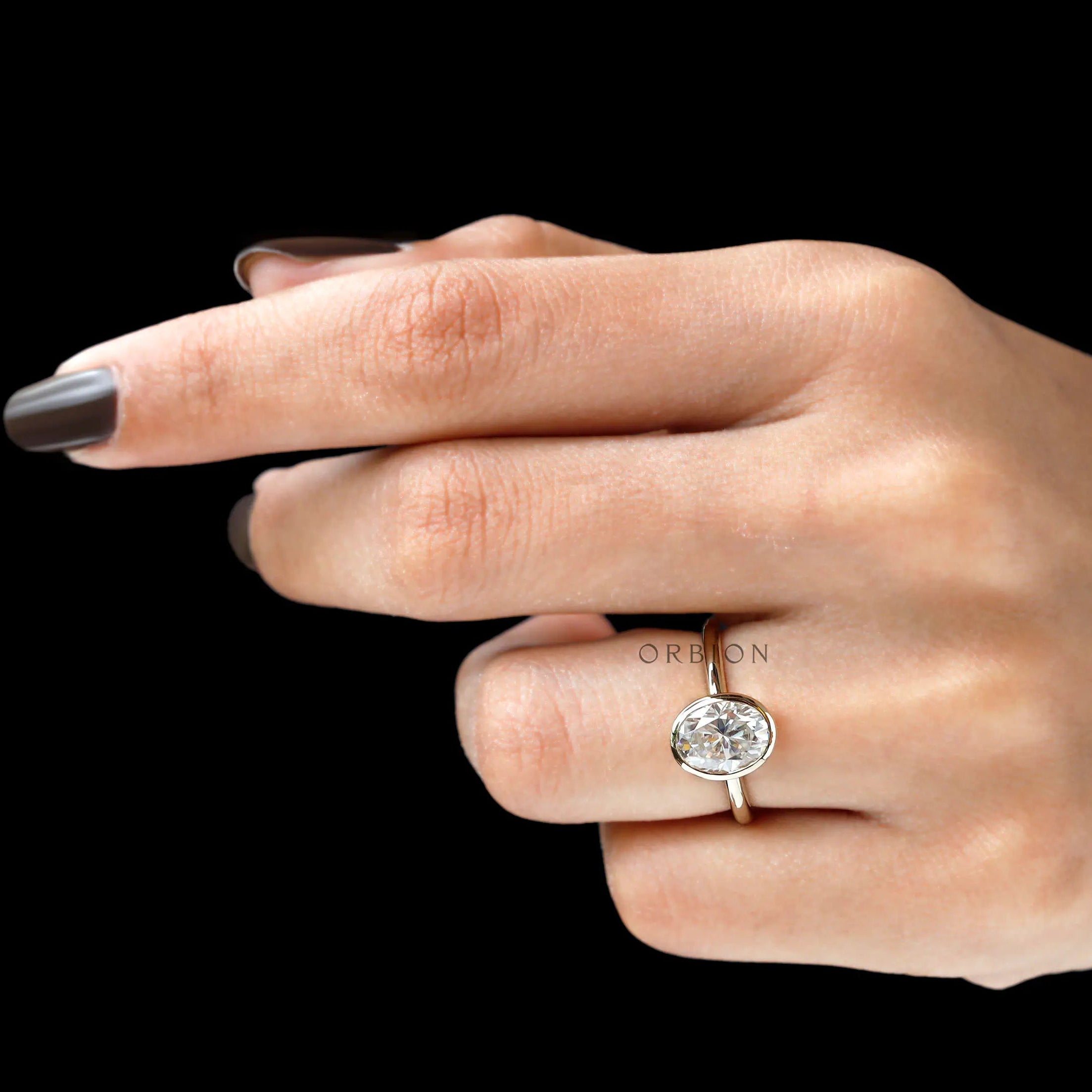 Modern oval lab diamond bezel set ring