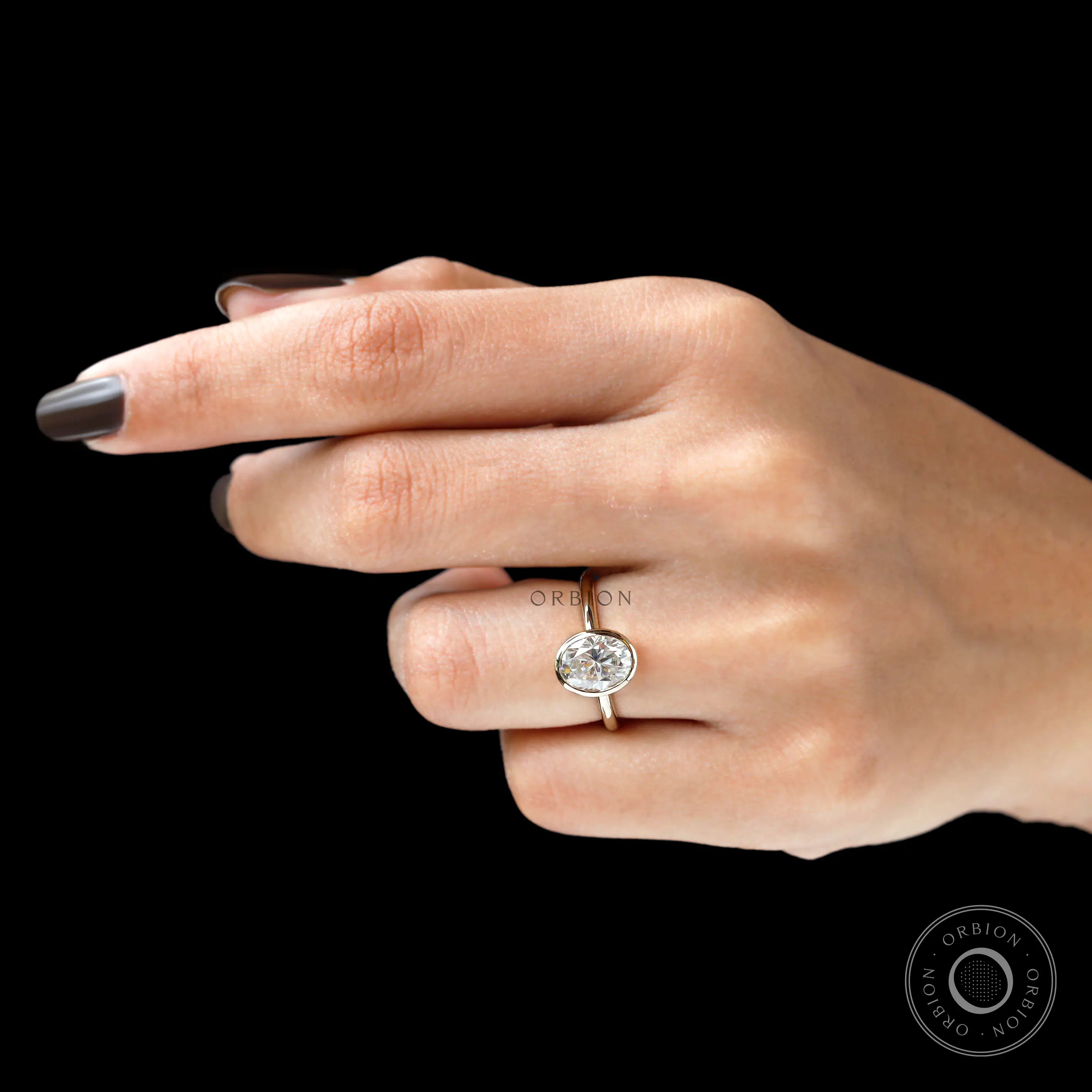 Modern oval lab diamond bezel set ring