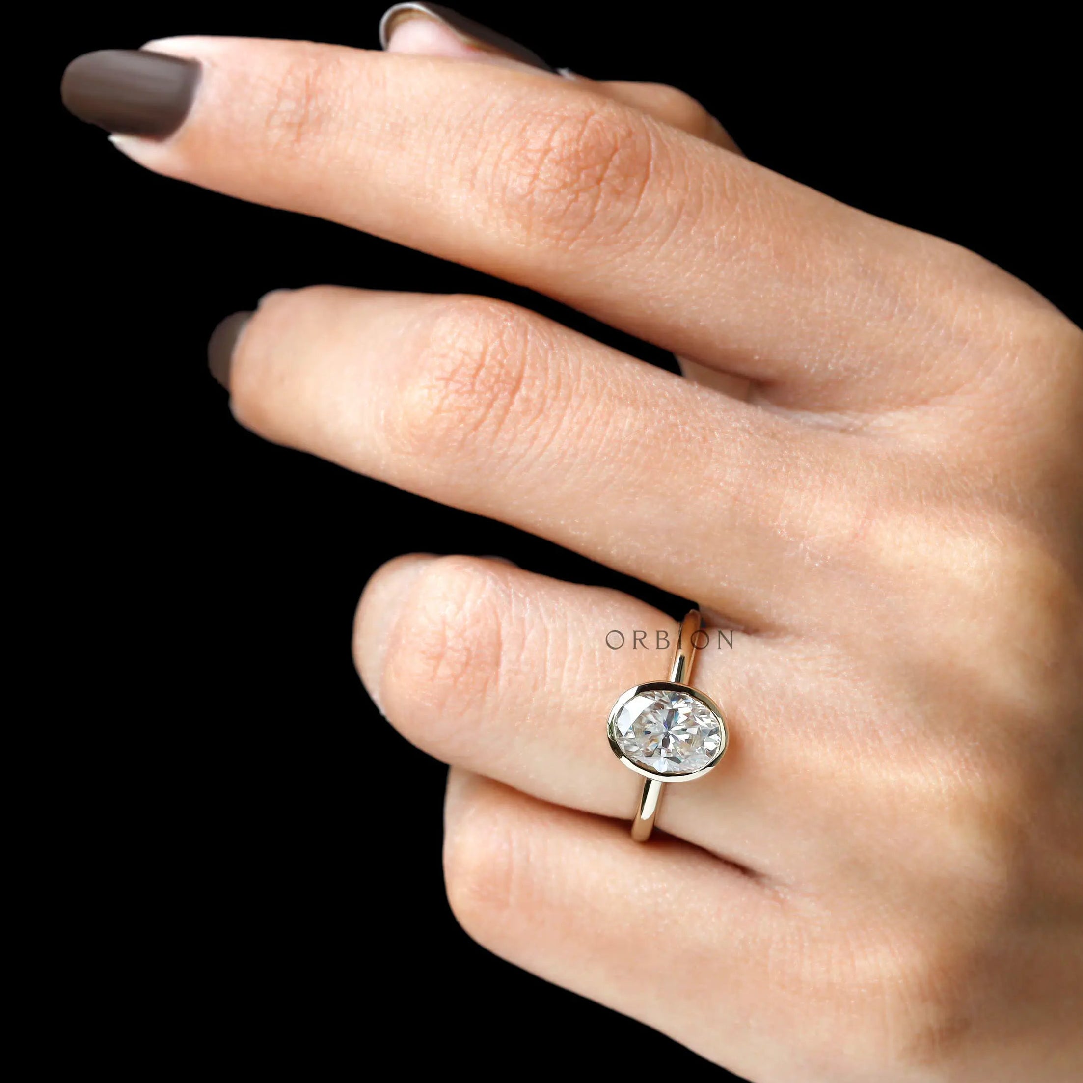 Floating bezel oval solitaire ring detailed craftsmanship