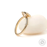 Oval solitaire ring with floating gallery design