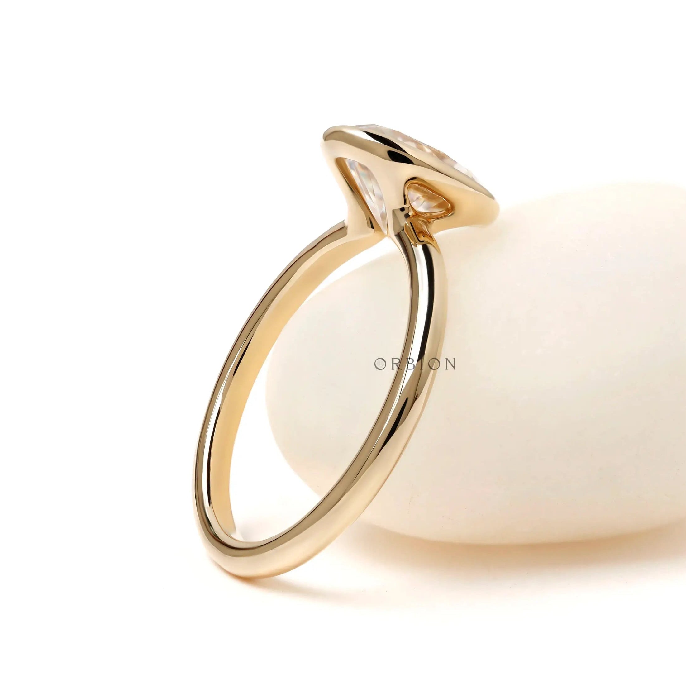 Oval solitaire ring with floating gallery design