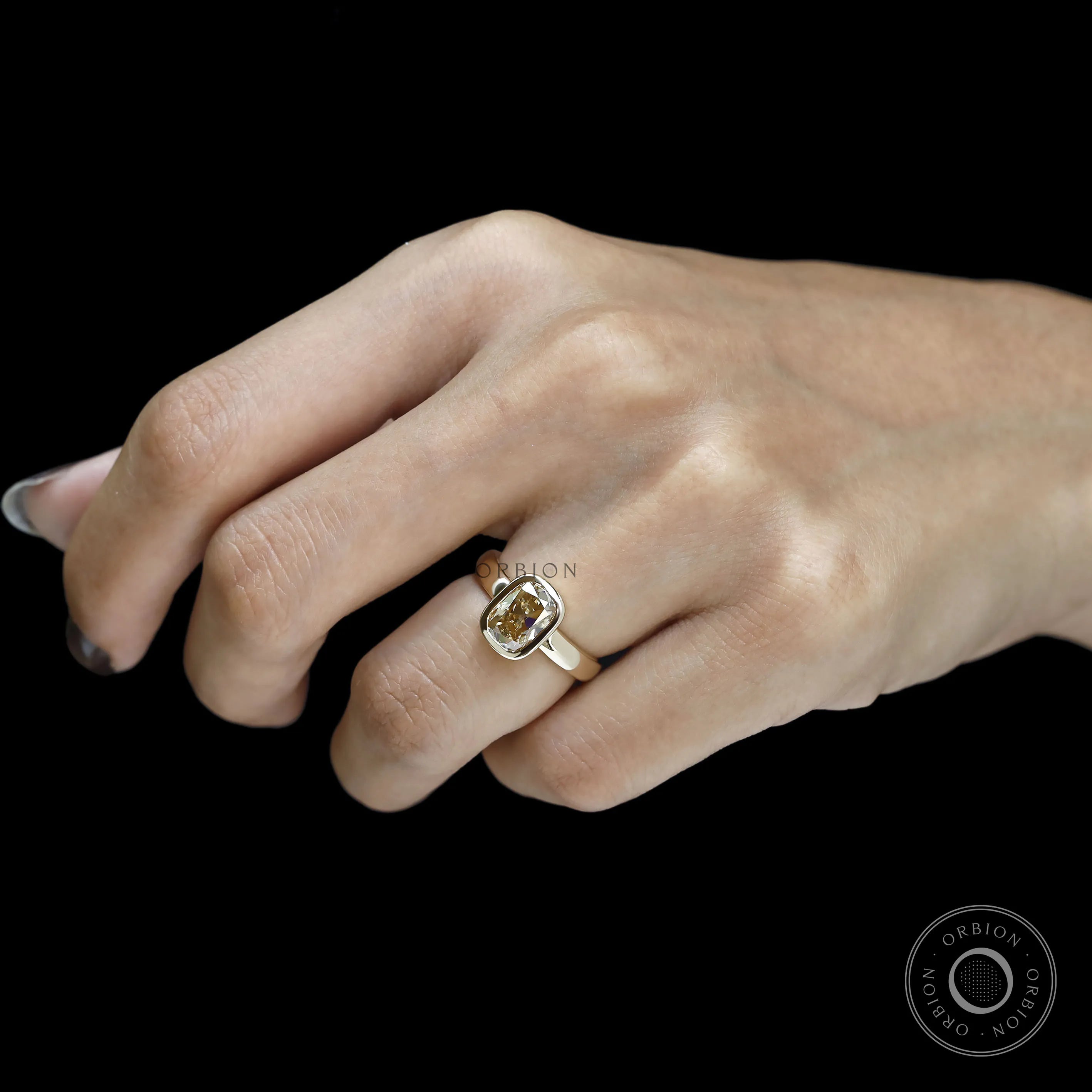 Bold Bezel Set Elongated Cushion Moissanite Ring in Yellow Gold