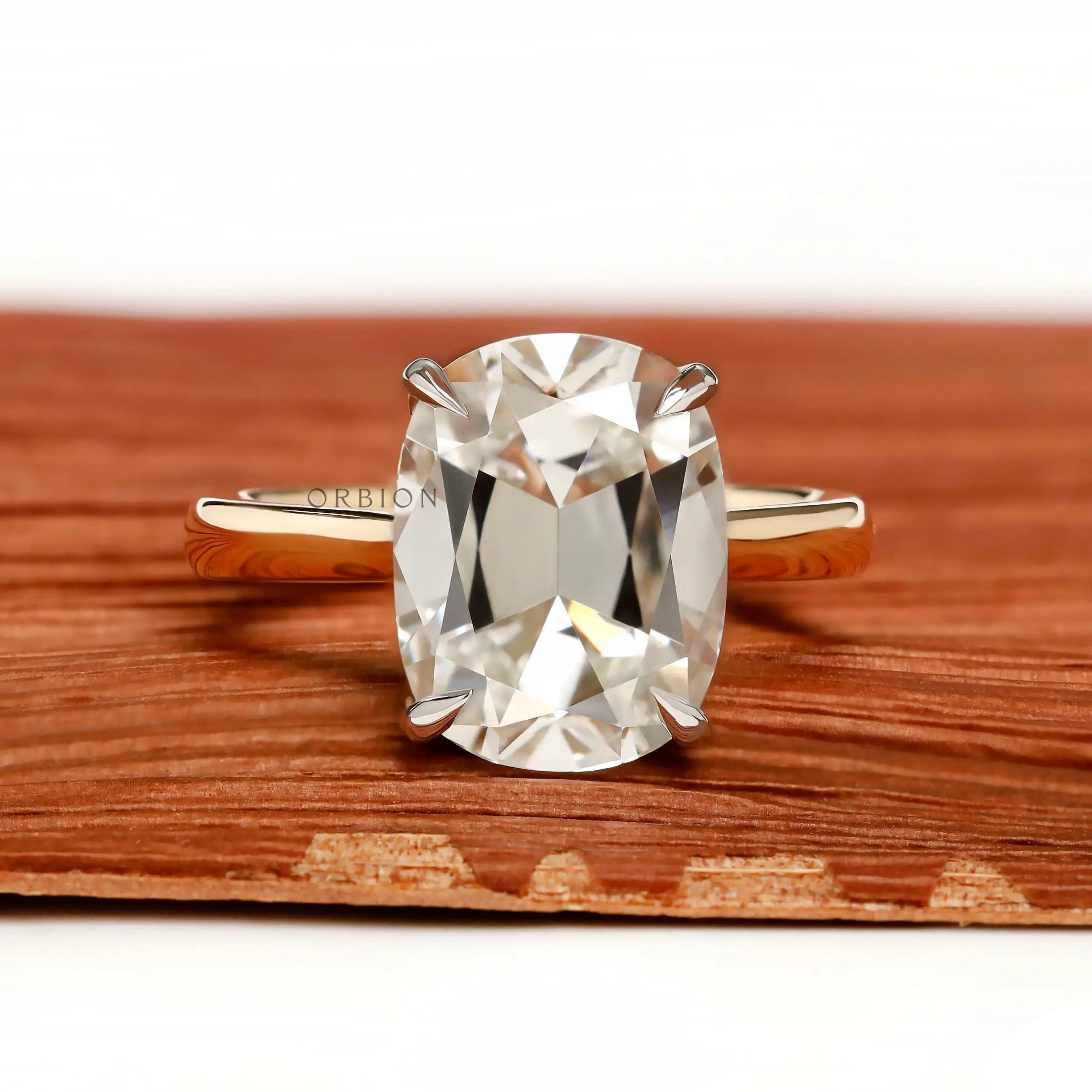 Front view elongated cushion old mine cut hidden halo ring