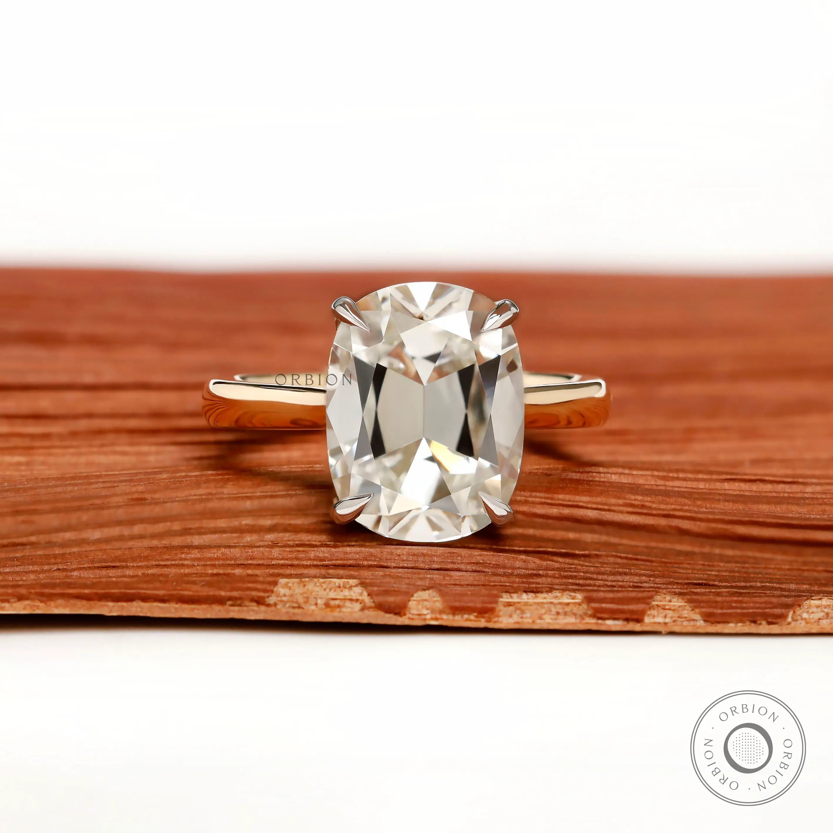 Front view elongated cushion old mine cut hidden halo ring