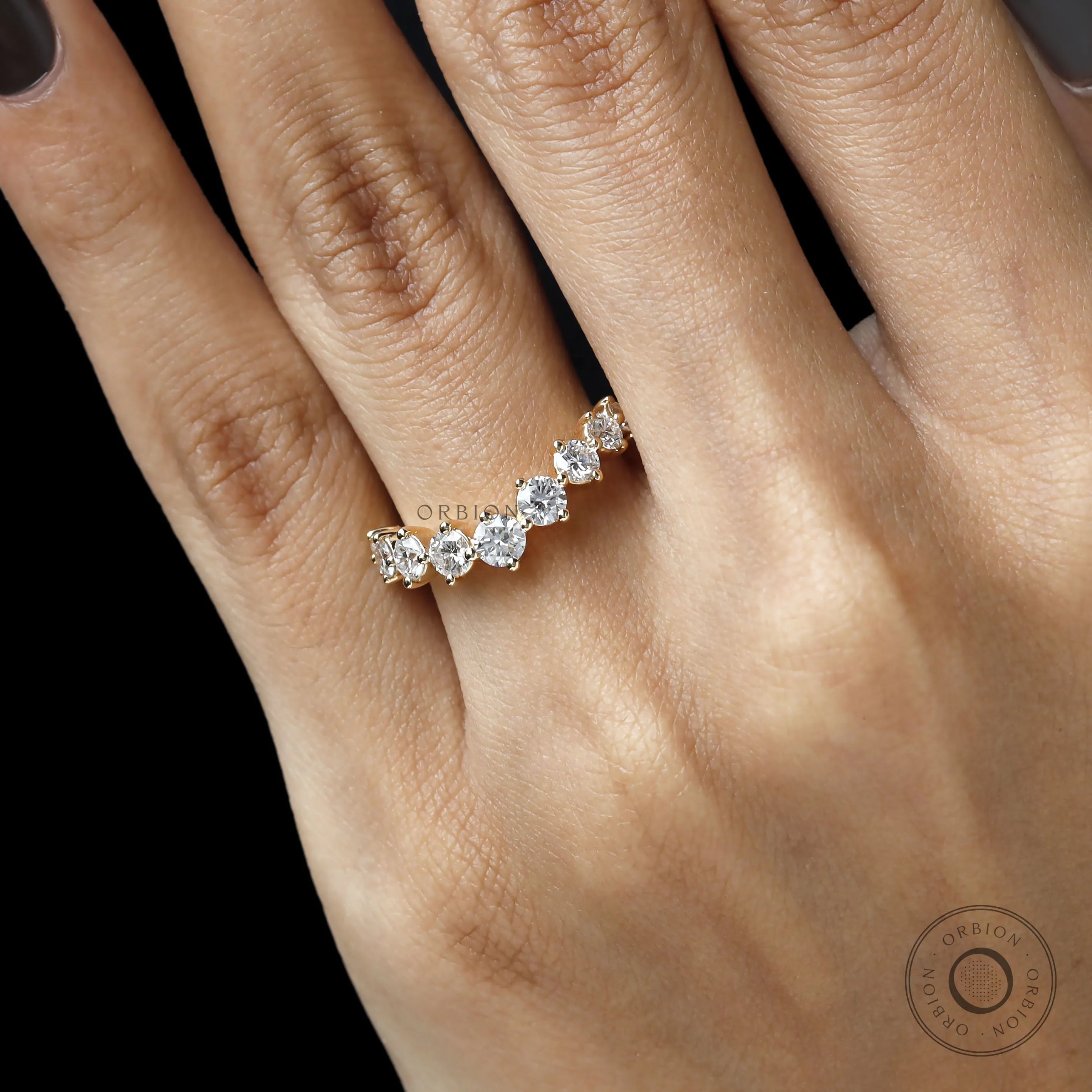 Curved stacking band with round lab diamonds in yellow gold