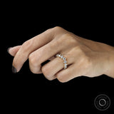 Gold contour wedding band with round diamond setting