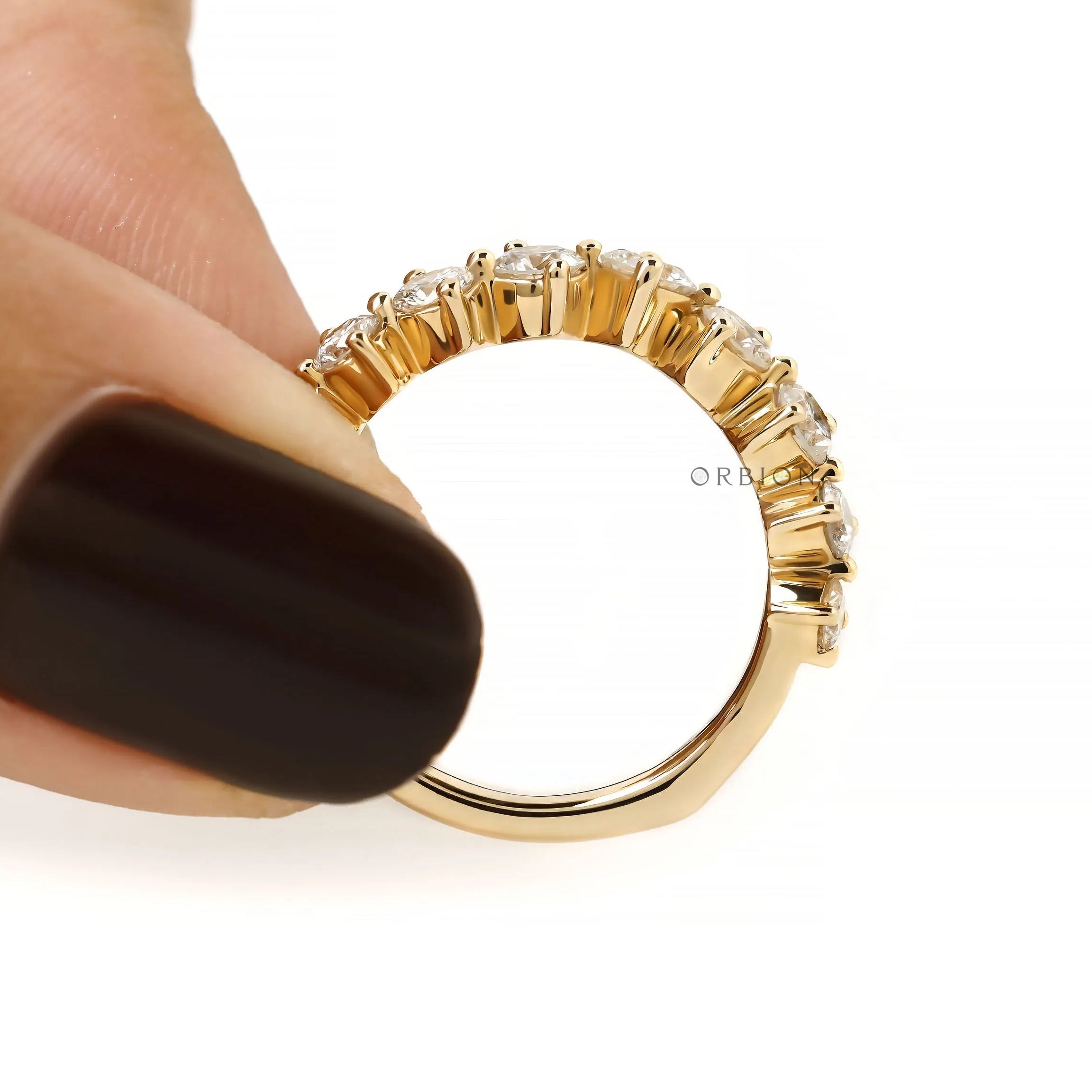 Contour style curved band with lab diamonds in yellow gold