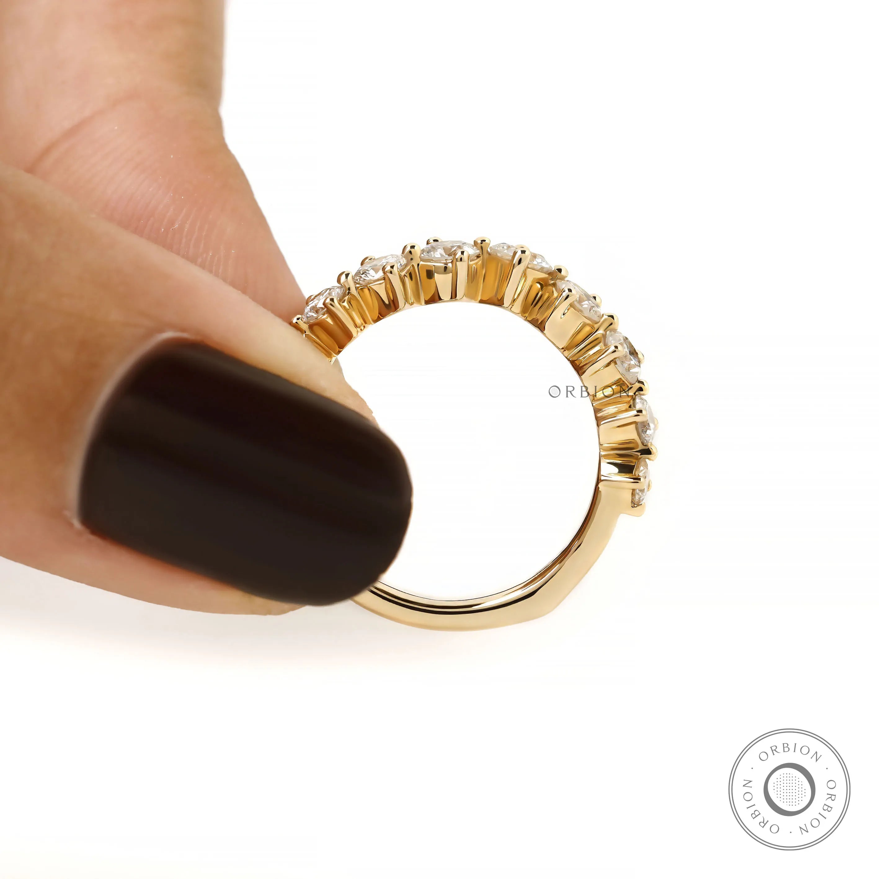 Contour style curved band with lab diamonds in yellow gold