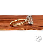 Side profile elongated cushion hidden halo engagement ring