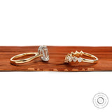 Side view of tulip set hidden halo ring and curved wedding band