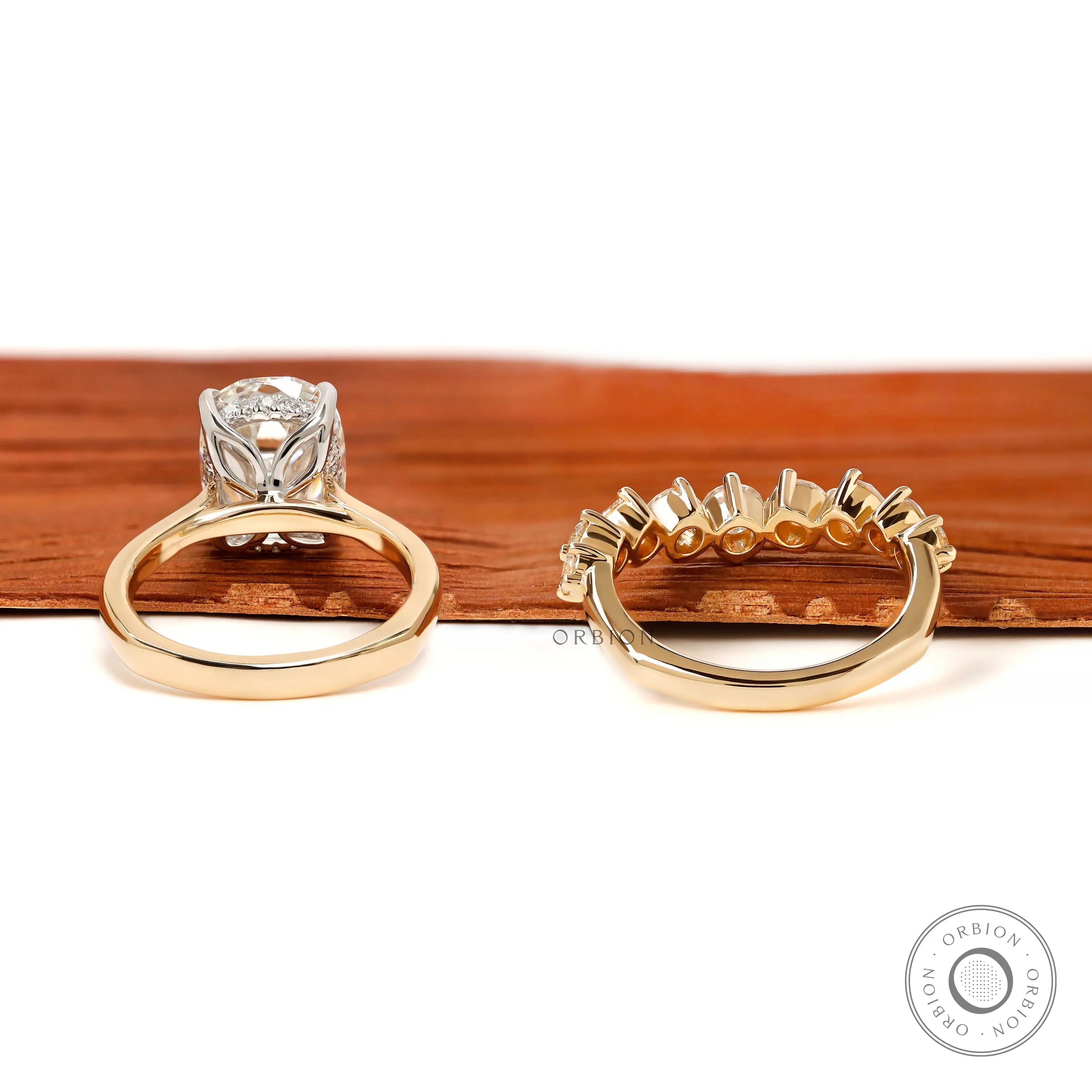 Back view of euro shank engagement ring and curved stacking band