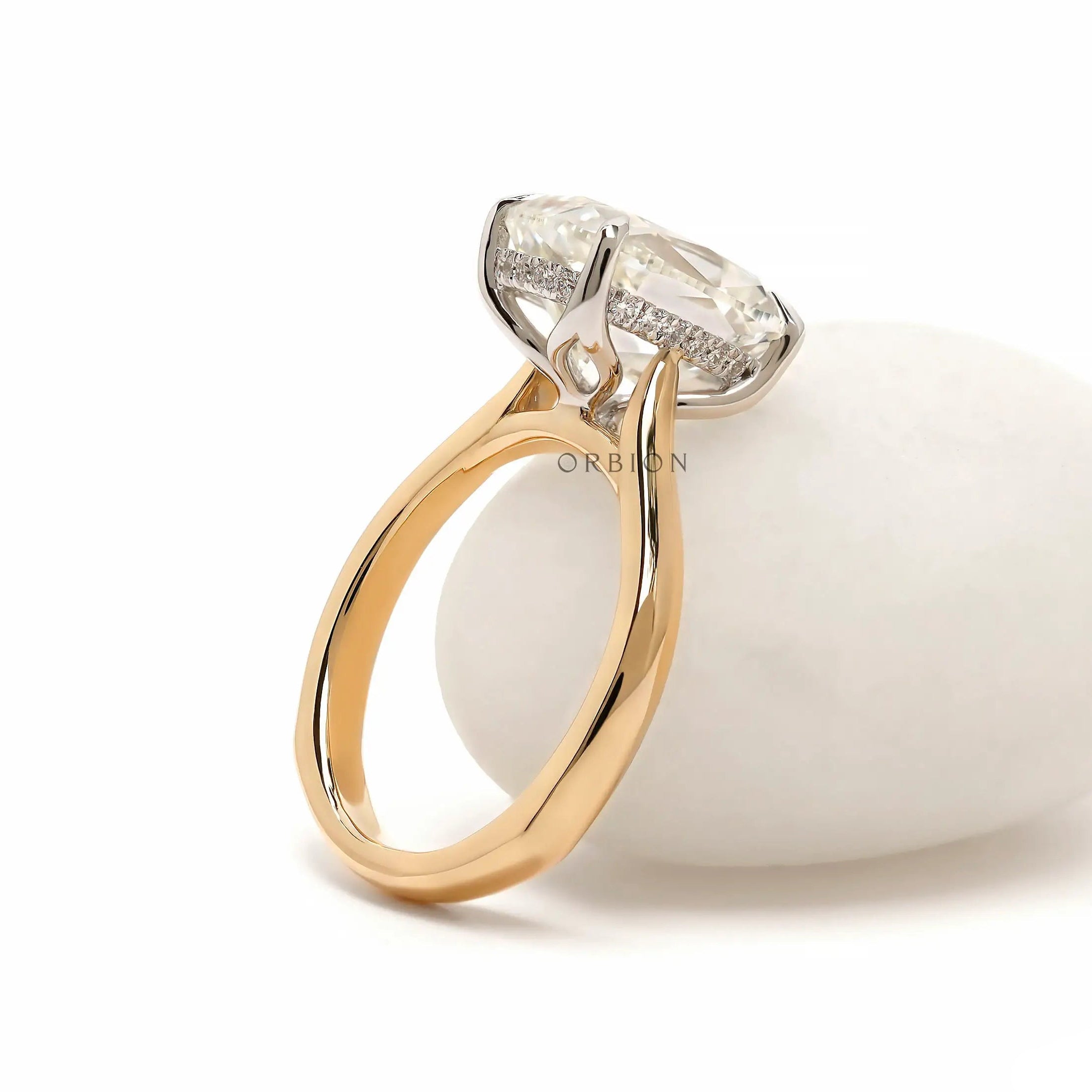 Hidden halo side detail dual tone solitaire ring closeup