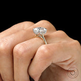 Angled hand shot elongated cushion dual tone solitaire ring