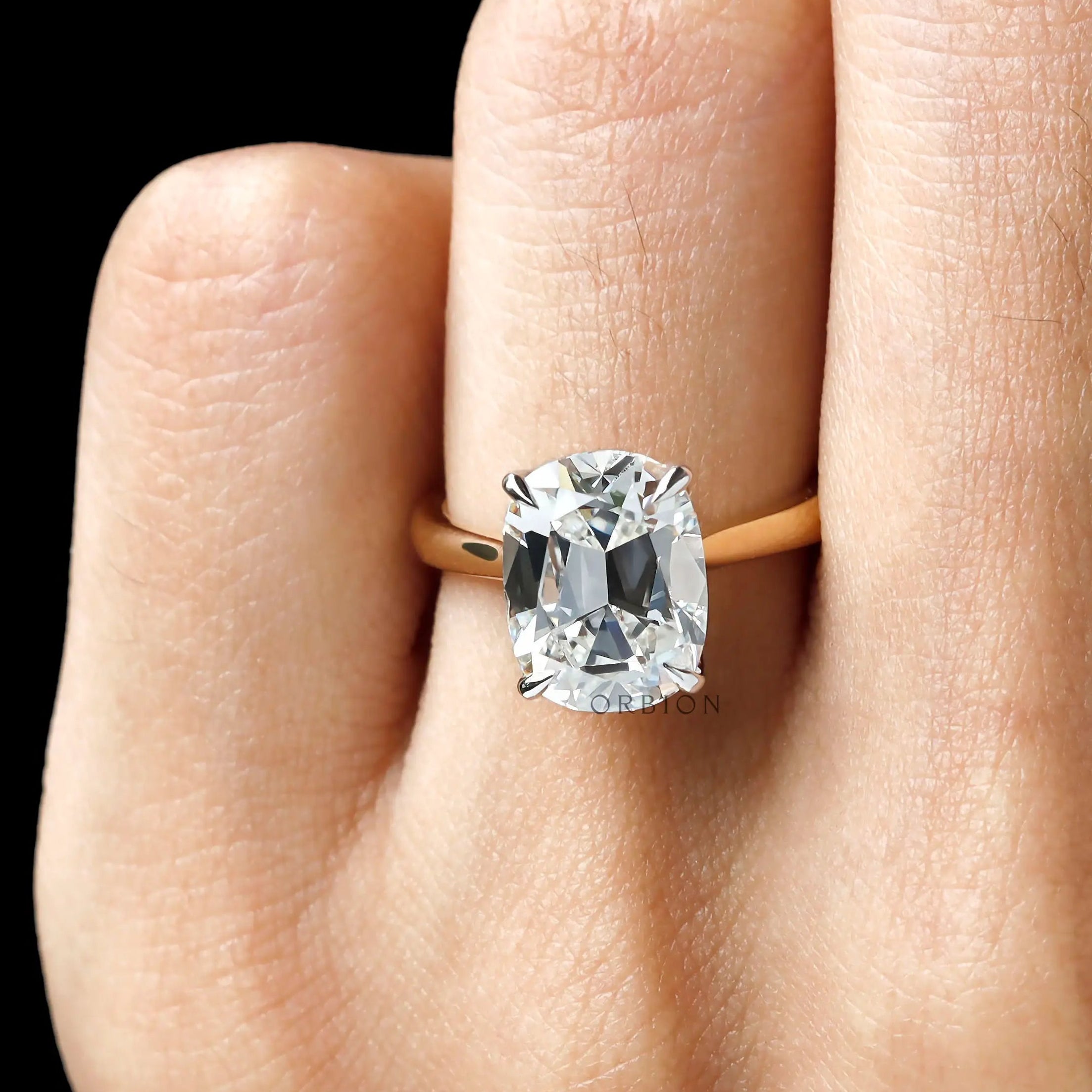 Top finger view elongated cushion old mine cut ring
