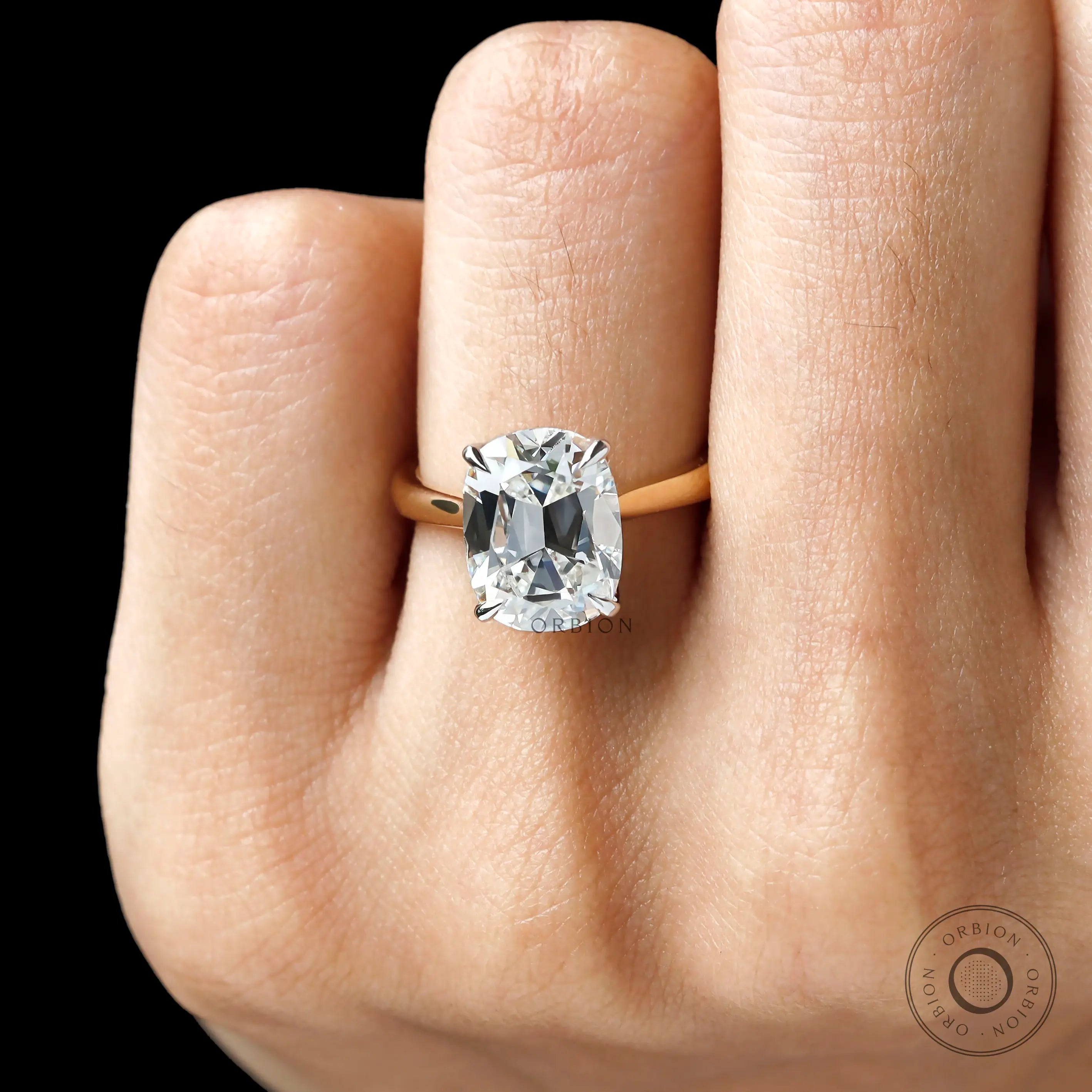 Top finger view elongated cushion old mine cut ring