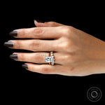 Hand side view of antique two tone bridal ring set