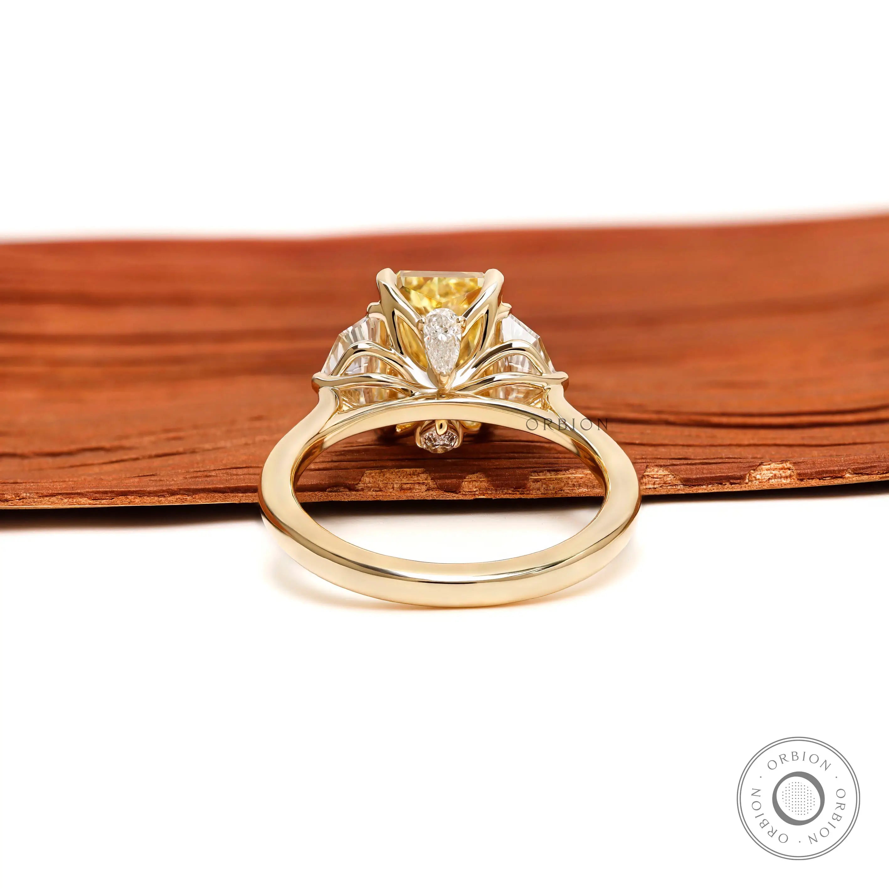 Back gallery view of three stone yellow diamond engagement ring