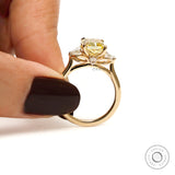 Detailed side gallery of radiant yellow diamond ring with accents
