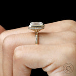 emerald cut lab diamond bezel halo ring yellow gold